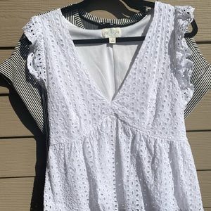 Peplum styled pure white blouse.